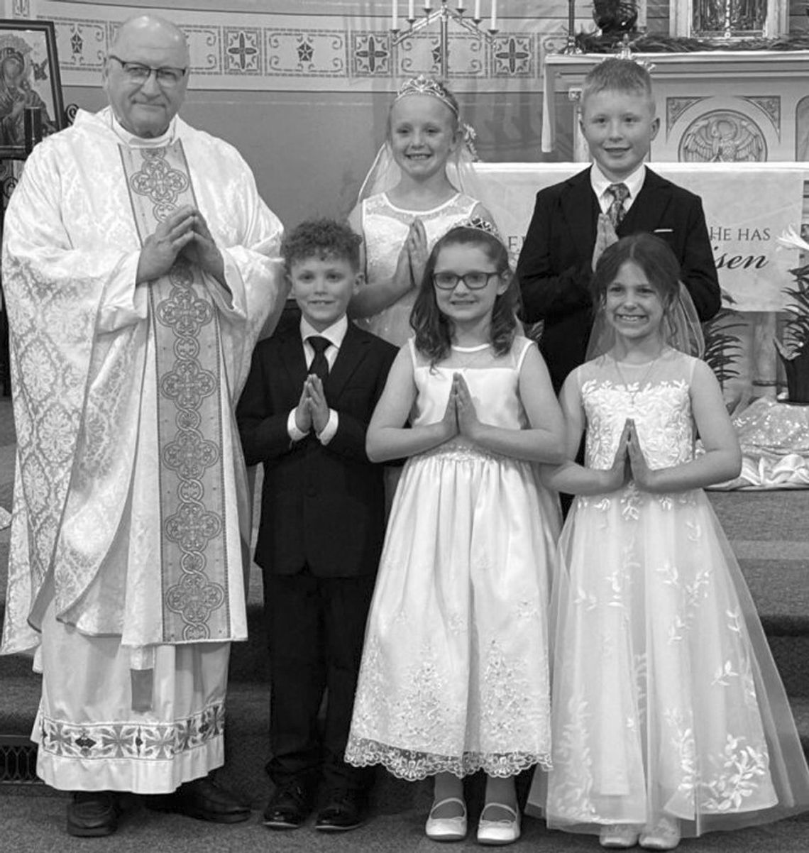 St. Mary's students receive first communion